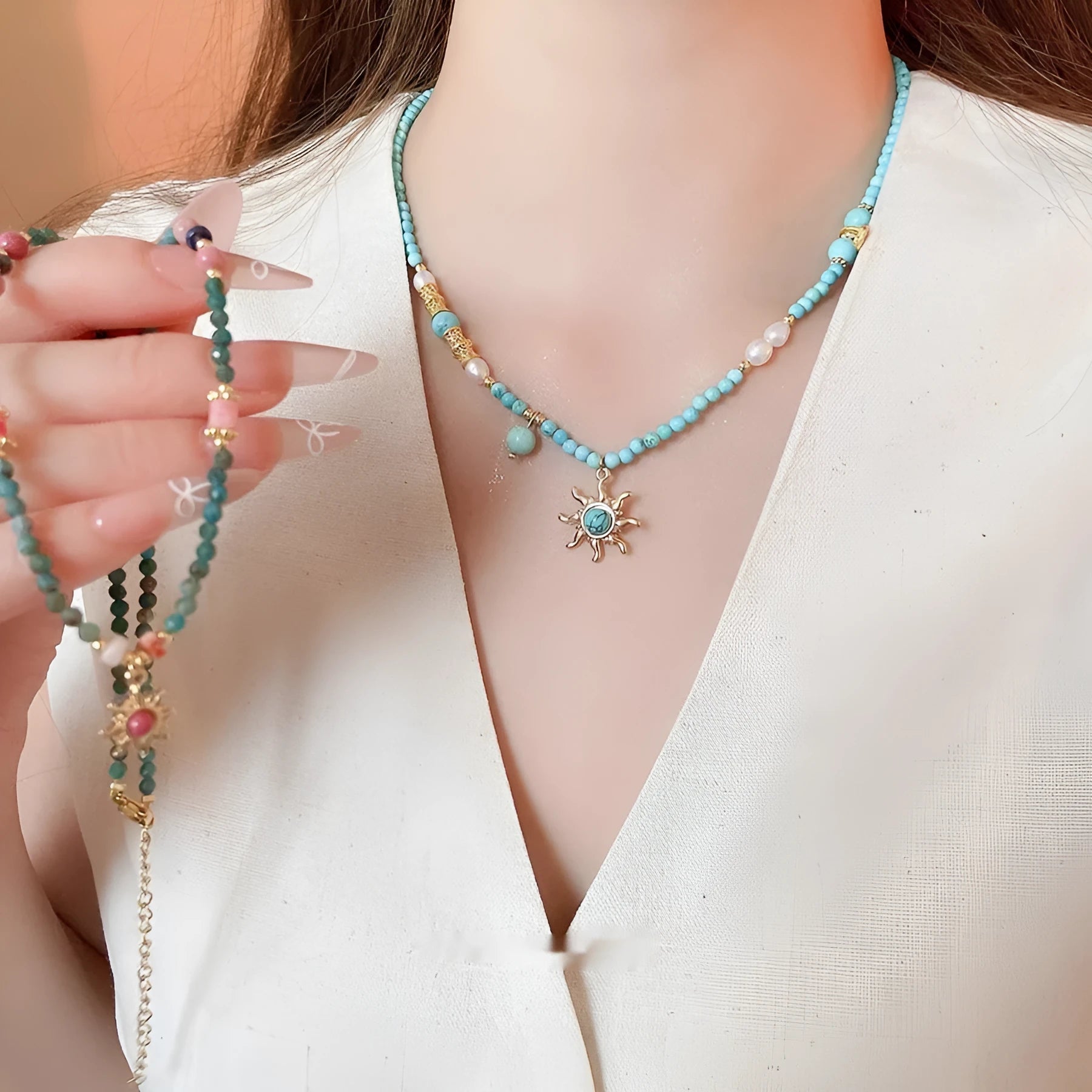 Freshwater pearl necklace with a geometry-shaped stone sun pendant on an electroplated chain.