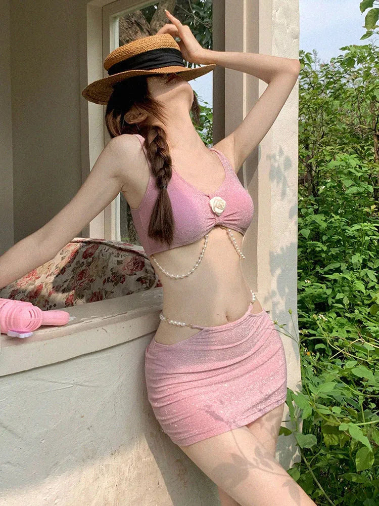 Women's pink and black three-piece polyester bikini set for swimming