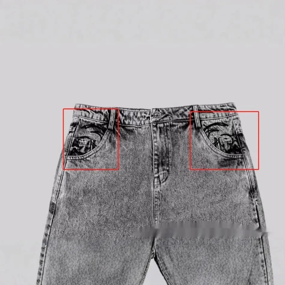 Grey loose straight-leg denim trousers showing mid-waist design and relaxed fit