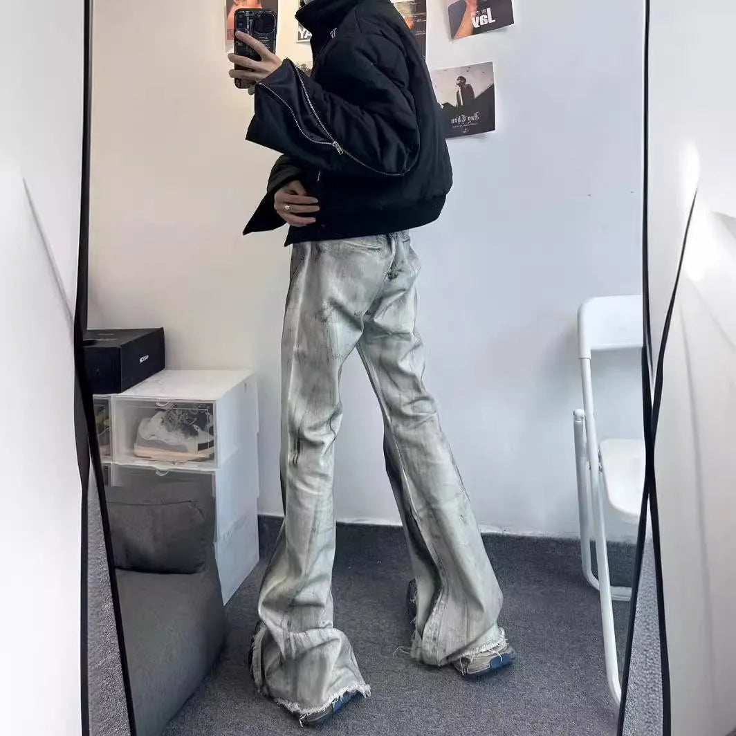 Men's white retro jeans with heavy rough denim texture and black ribbon gradient colour detail on the legs.
