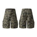 Loose fit retro shorts in washed cotton cloth, shown in grey, green, camouflage, and blue colour options.