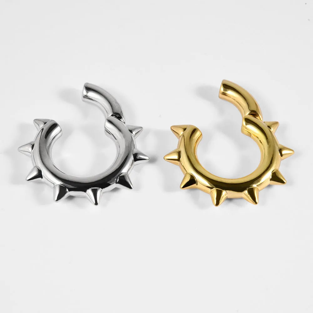 Copper geometric cone-shaped ear extender with magnetic clip-on fastening.