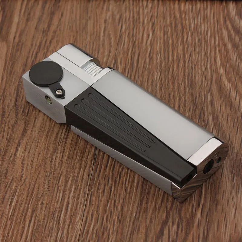 Metal pipe lighter with folding flap covering lighter mechanism and stash compartment