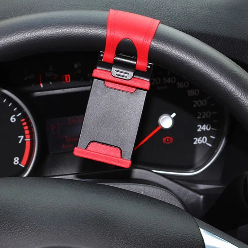 Black universal car steering wheel clip mount holder holding a mobile phone.