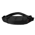 Black Oxford cloth waist pack with crossbody strap showing multiple interior compartments