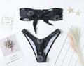 Black women's one-piece swimsuit with bikini print pattern and backless split tube top design