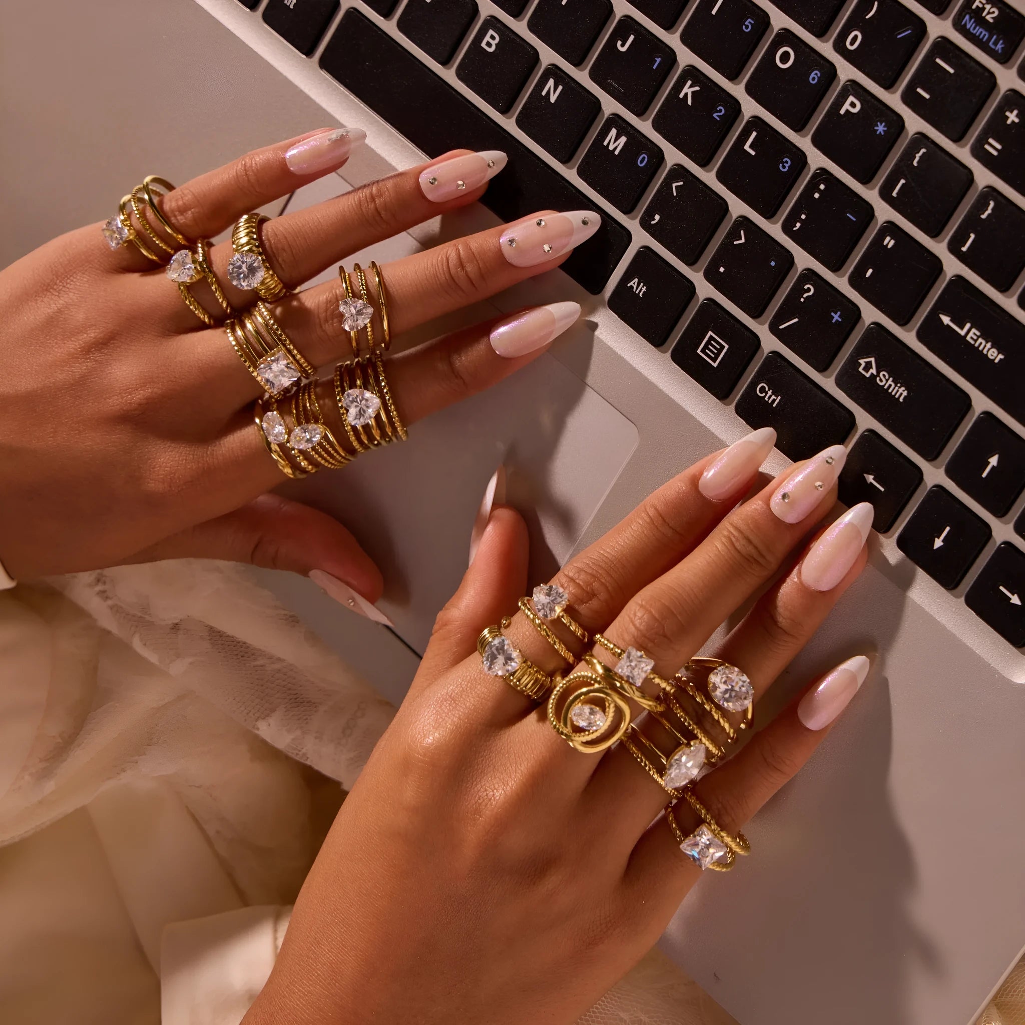 Gold electroplated stainless steel ring with zircon detailing and open mouth adjustable design