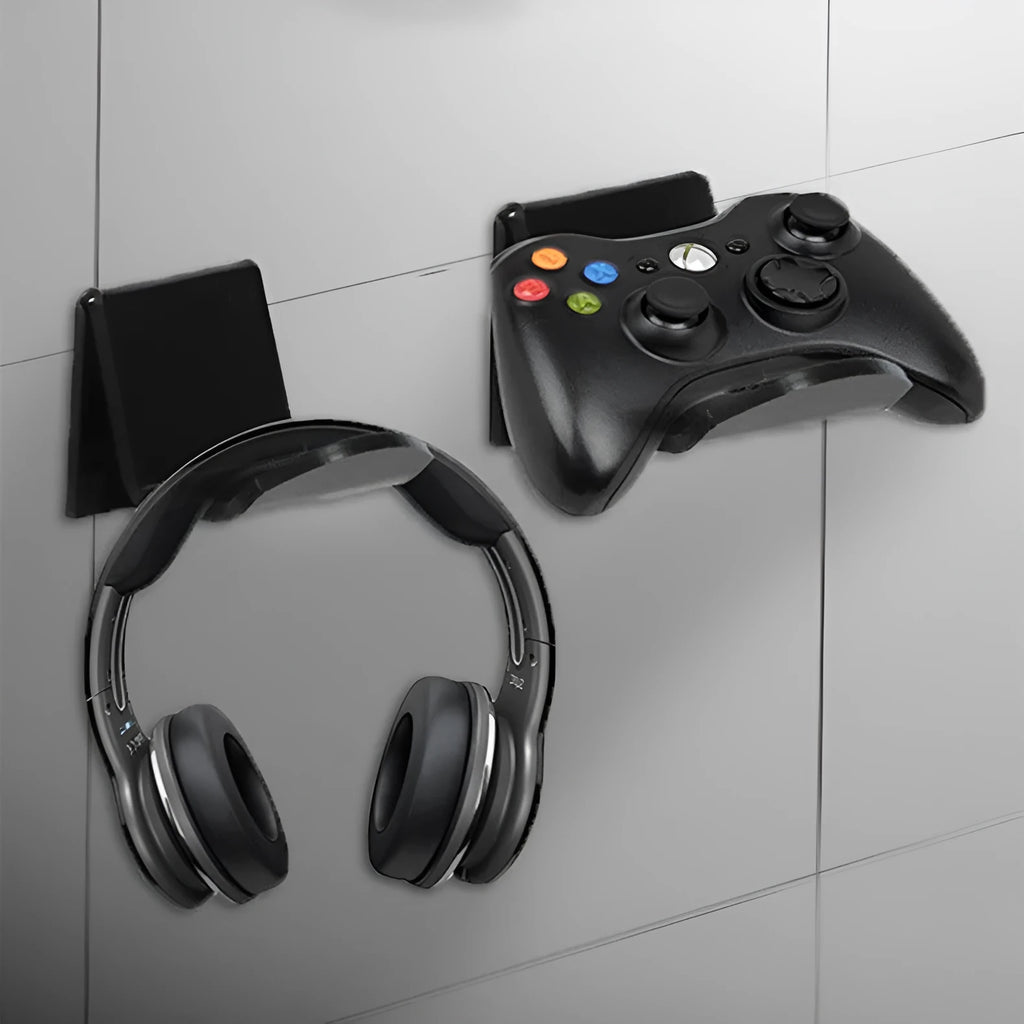 A universal plastic wall mount bracket for game controllers, shown in black colour