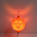 Pumpkin-shaped decorative lamp with USB cable for purple or yellow ambient lighting