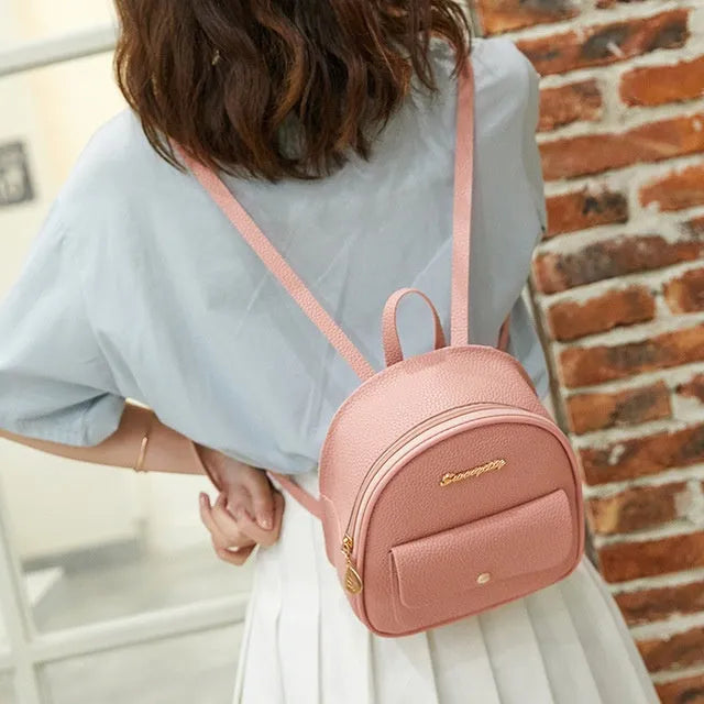 Women's small PU shoulder backpack purse in multiple colours with zipper closure