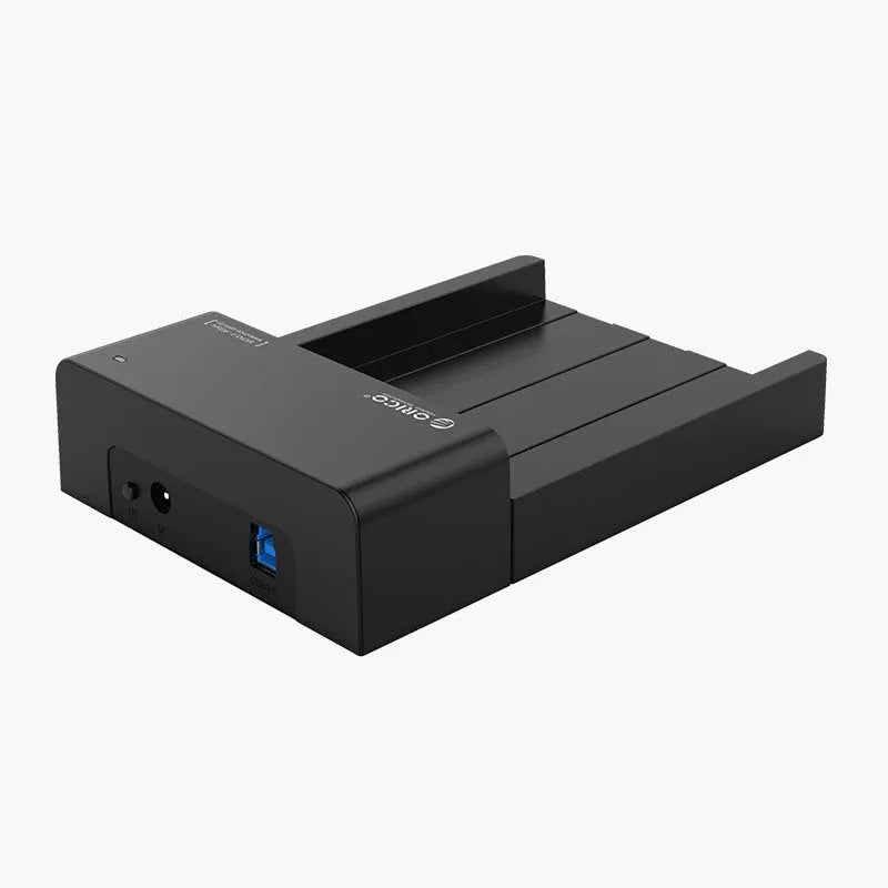 Black universal SATA hard drive enclosure for 2.5-inch and 3.5-inch drives with data cable.