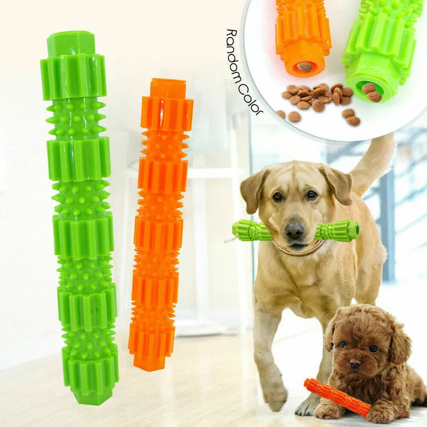 Green and orange rubber dog chew toy with treat dispensing opening and textured cleaning surfaces