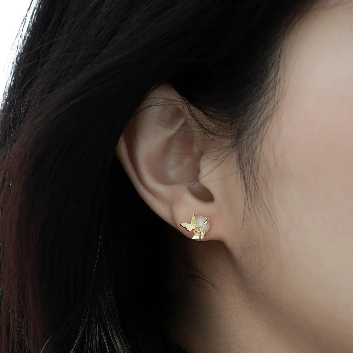 Butterfly design ear studs in 925 silver with white gold or gold electroplated finish