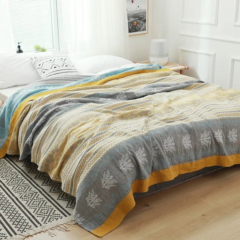 Five-layer pure cotton gauze bed blanket in modern simplicity style, shown in blue roulette wheel pattern.