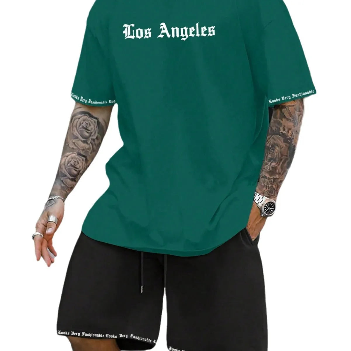 Sports style short-sleeved top and matching shorts set in solid colour on hanger