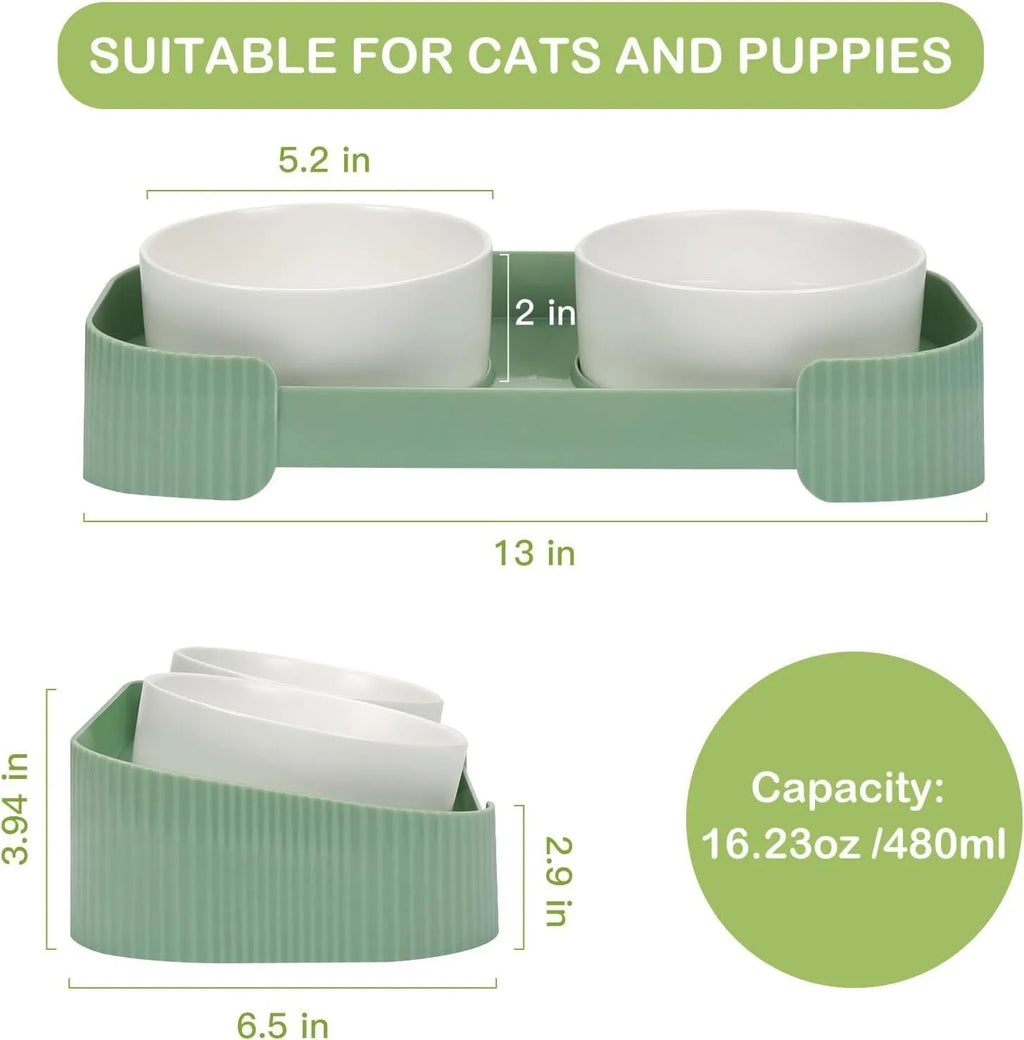 Green ceramic raised cat bowl set with two tilted bowls on a non-slip base