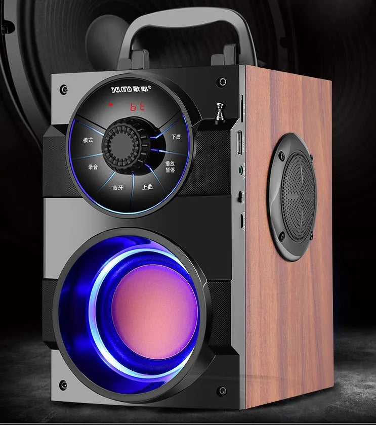 Black portable mini audio system with satellite speakers and subwoofer, 3.5mm cable, and USB power input.