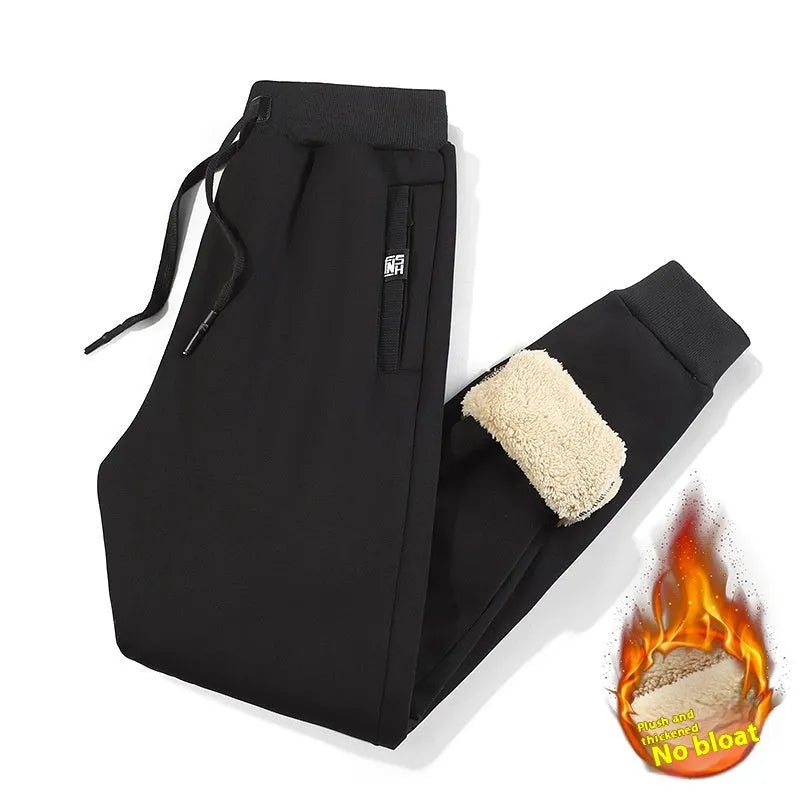 Men's grey fleece-lined track pants with elastic waistband shown flat