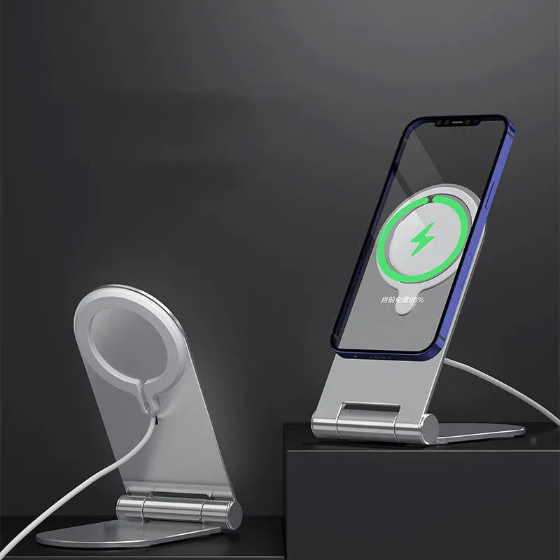Silver vertical adjustable portable magnetic phone bracket on a metallic surface