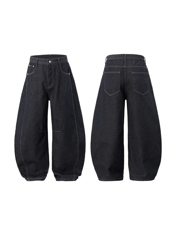 Men's wide leg denim trousers in original cow colour showing mid waist design and straight leg cut