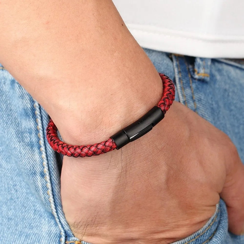 Black stainless steel bracelet with natural zircon stone on neutral background