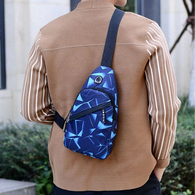 Men's blue oxford cloth sling chest bag with earphone hole and adjustable shoulder strap