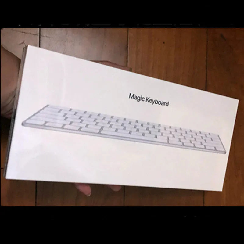 White Apple G6 Bluetooth keyboard with ultra-thin metal casing and multimedia keys