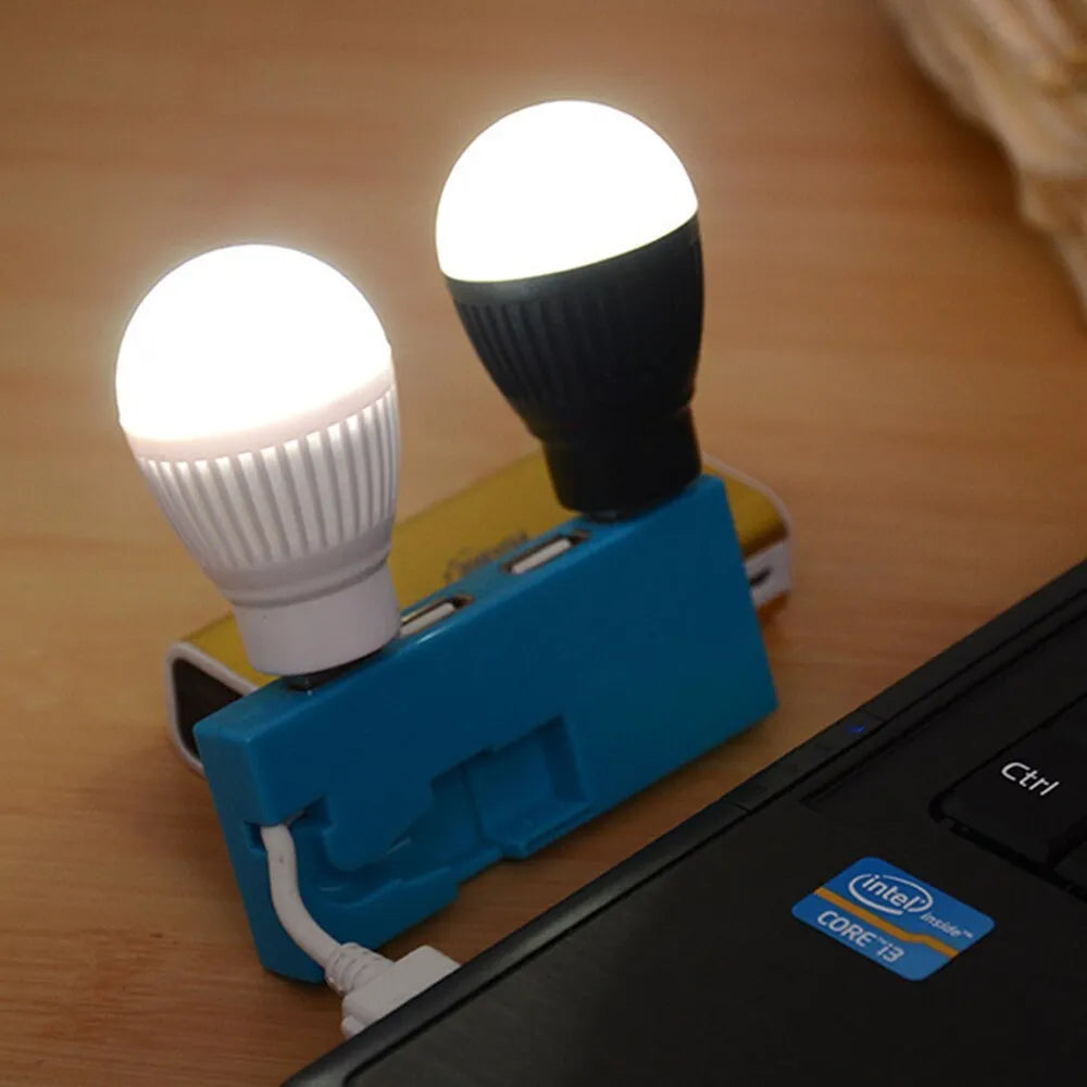 Mini USB LED lamp portable night light in black with USB cable, showing compact design for travel use
