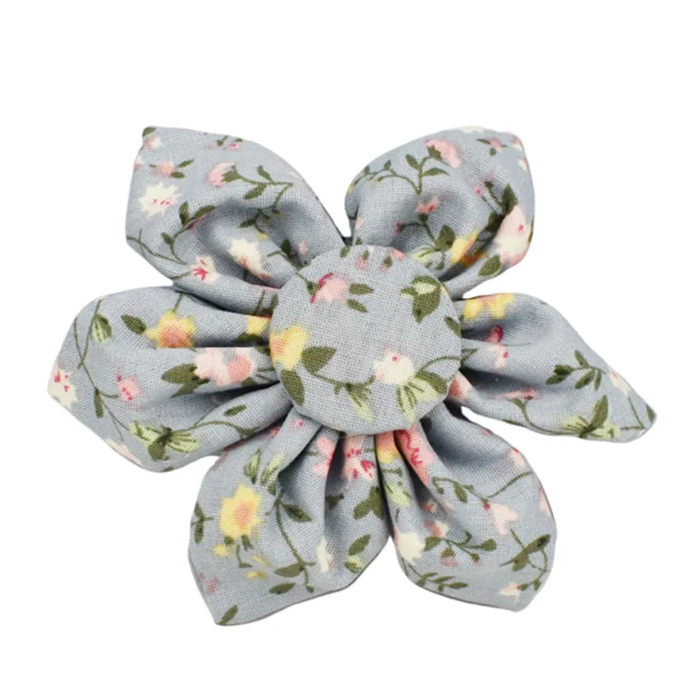 Blue floral pattern dog collar made from polyester cotton fabric with adjustable strap and decorative bow accessory.