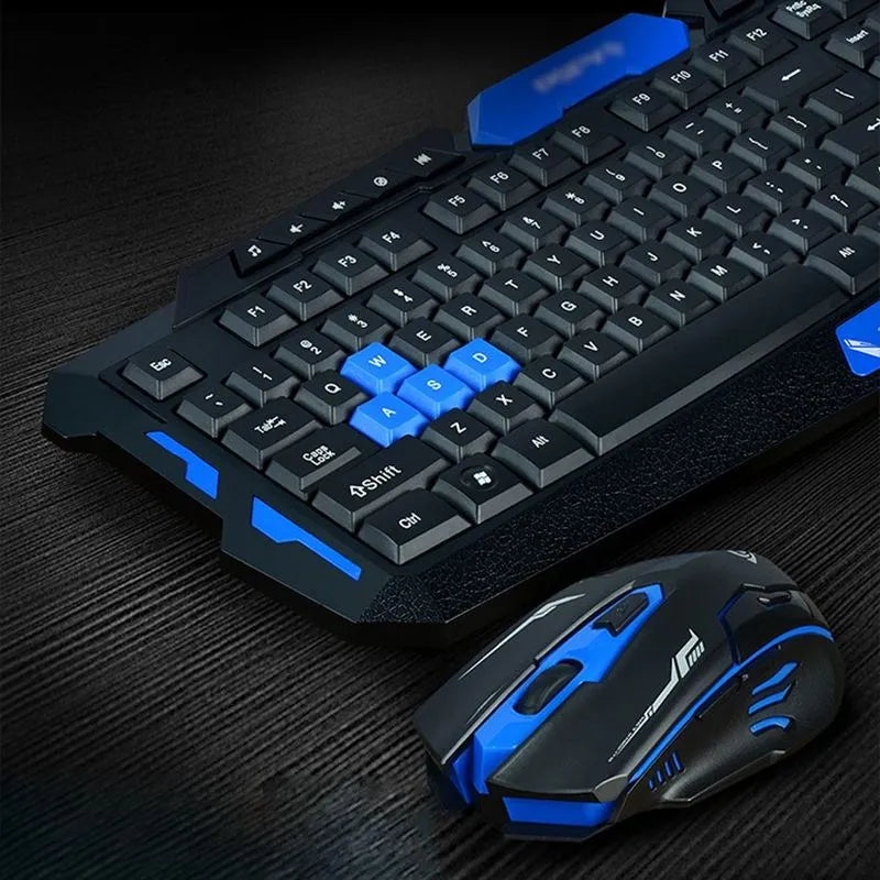 Black and blue wireless keyboard and mouse set with ergonomic design on desk