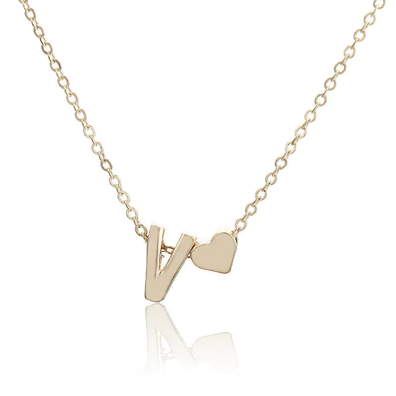 Peach heart shaped letter necklace pendant in gold or silver alloy metal