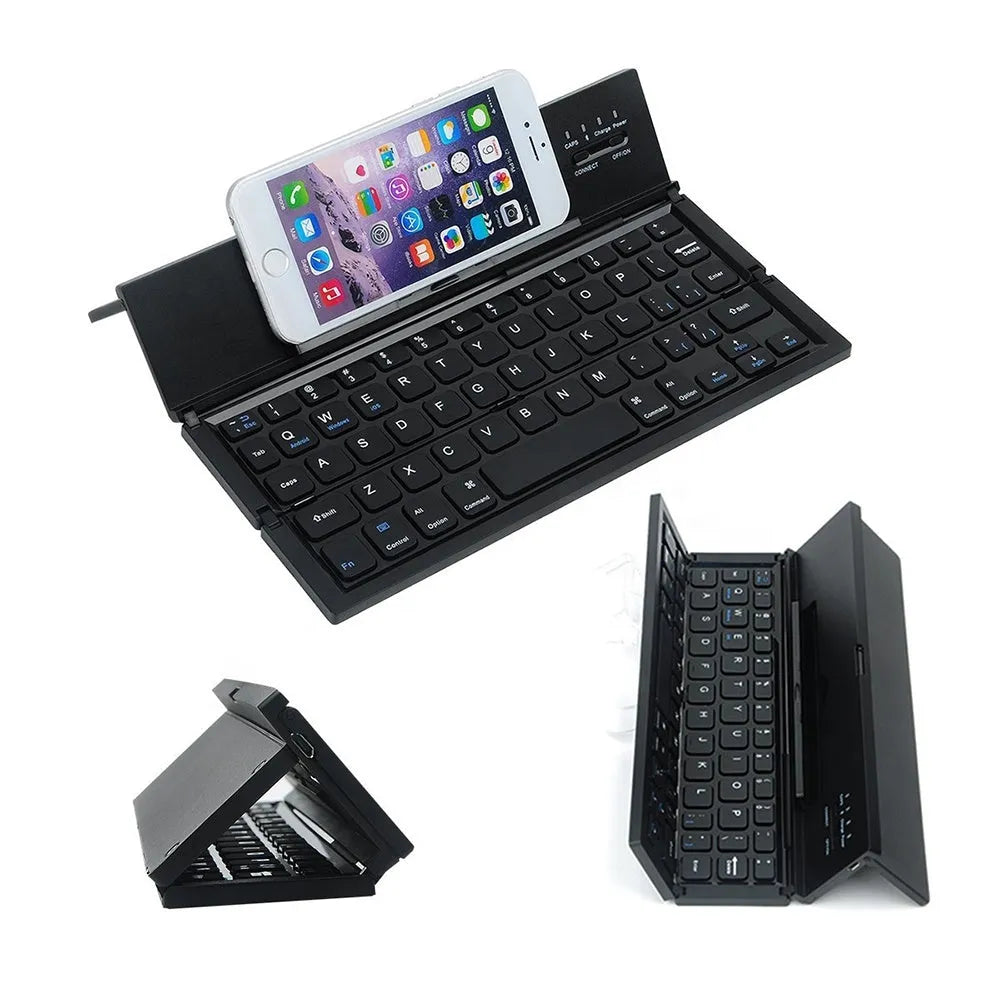 Black mini folding Bluetooth keyboard shown open next to a tablet, displaying its compact 5.8-inch size and aluminium bottom.
