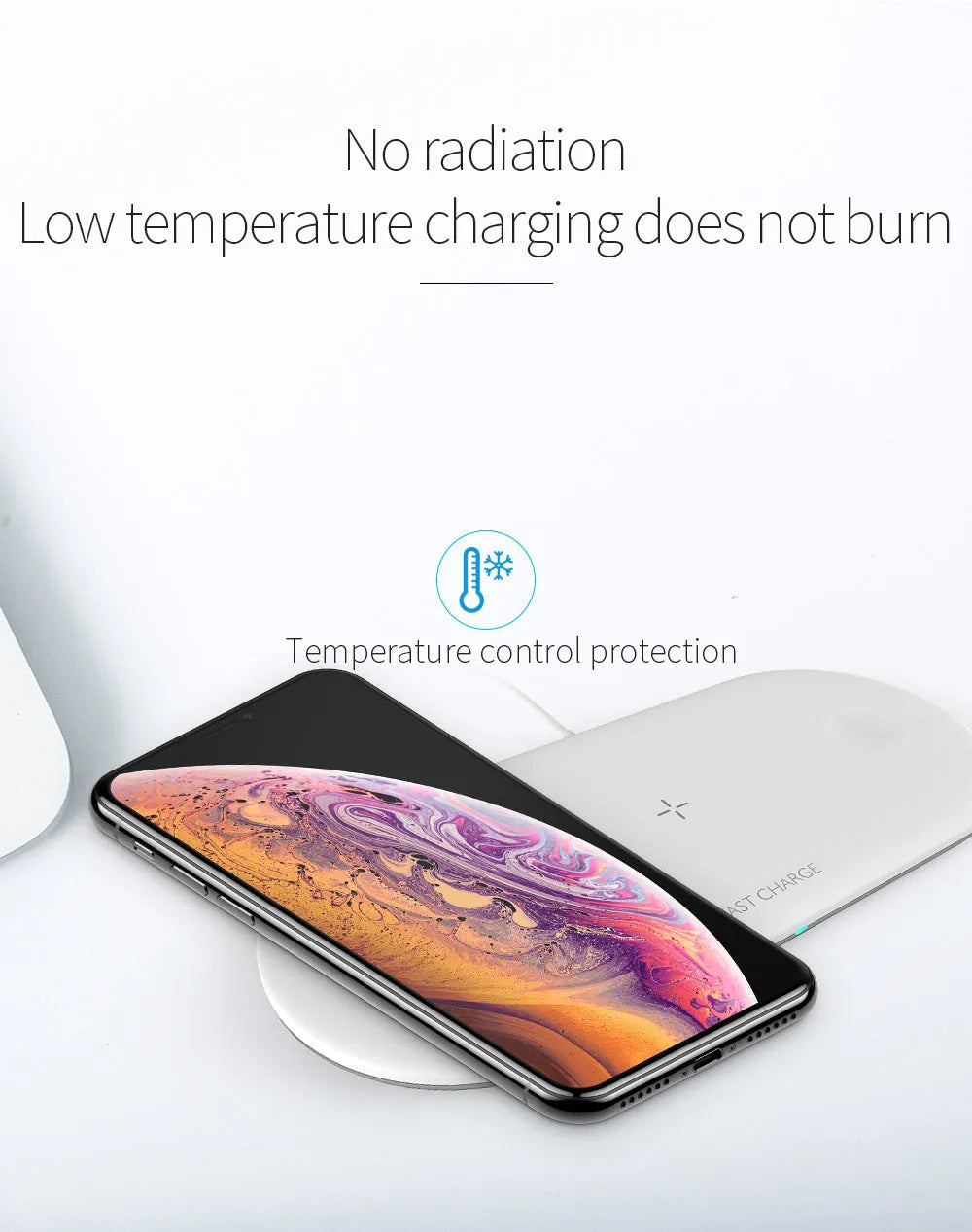 White three-in-one wireless charging station for Apple iPhone, iWatch and headphones on a desk.