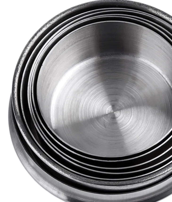 Silver stainless steel collapsible travel cup folded small on a key ring for outdoor use