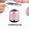 Compact cylindrical Hieha XQ11 portable Bluetooth speaker in metal casing showing colour options.