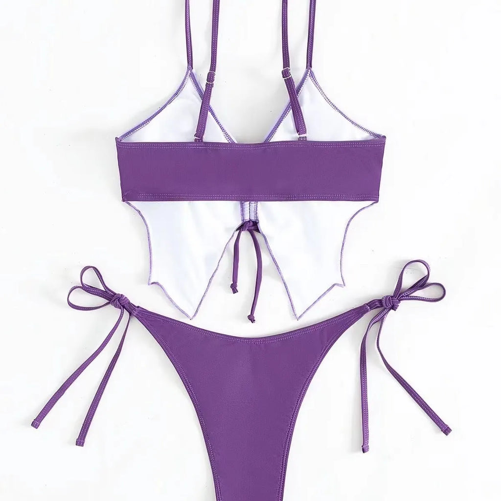 Women's purple bikini swimsuit with sleeveless top and briefs on a mannequin.