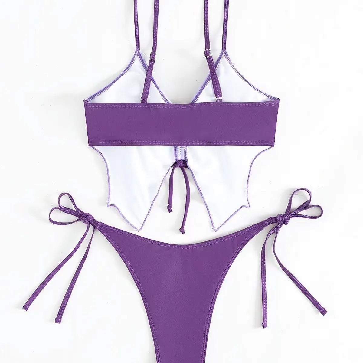 Women's purple bikini swimsuit with sleeveless top and briefs on a mannequin.