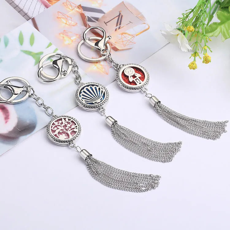Alloy tassel aromatherapy car pendant with chain and essential oil diffuser compartment in multiple colour options
