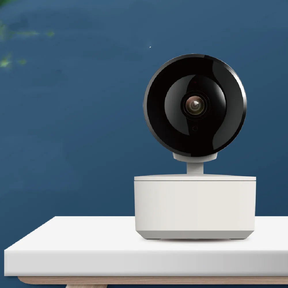 White indoor WiFi security camera with lens on a swivel base for pan and tilt movement.