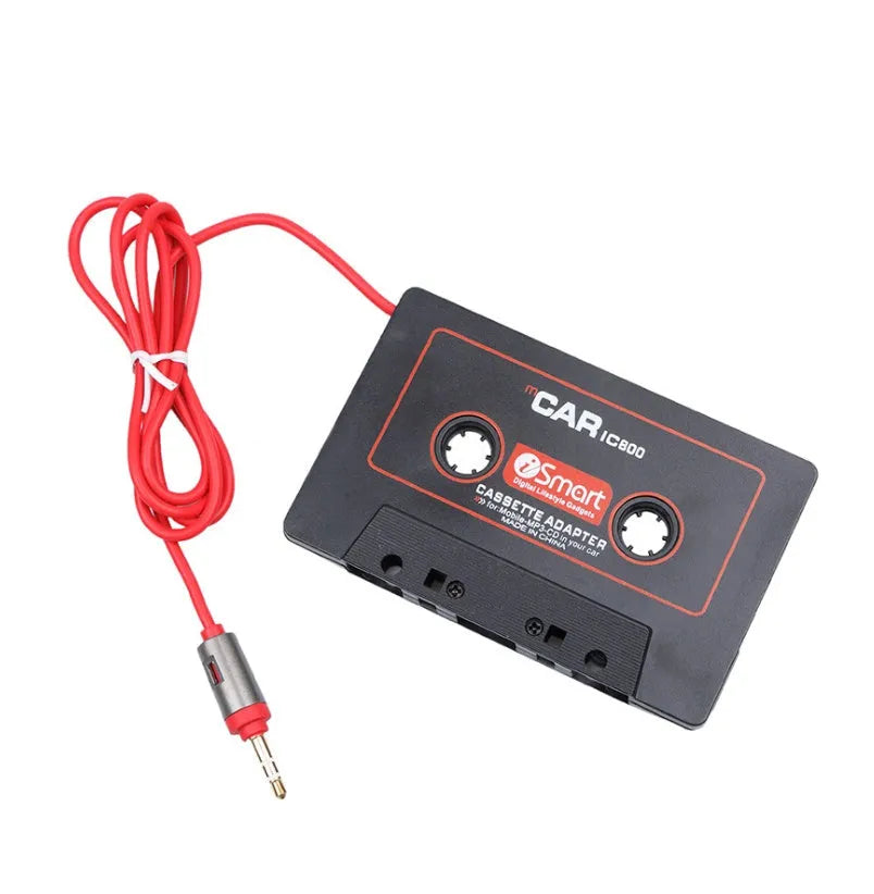 Black MP3 car cassette adapter with 3.5mm jack plug for connecting phones and music players.