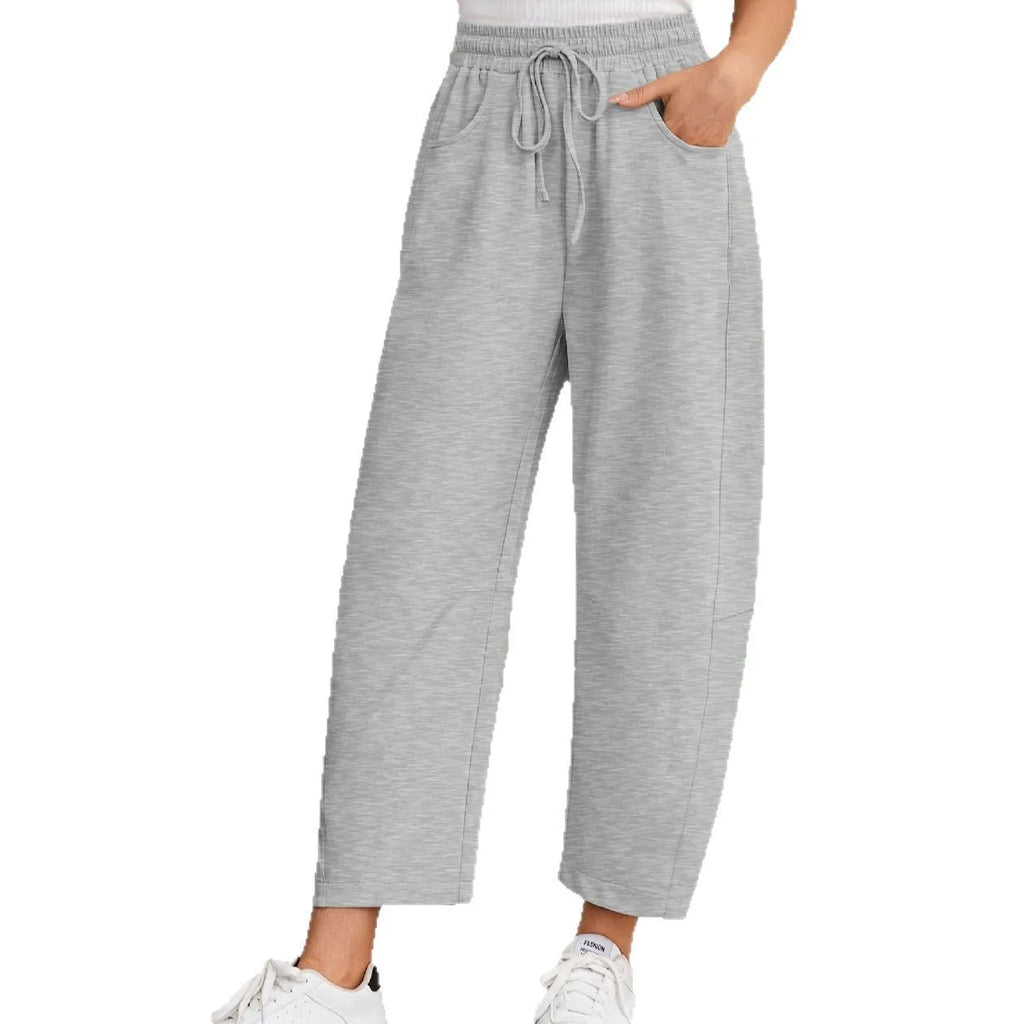 Women's loose fit cropped sweatpants with drawstring waist and side pockets in cotton blend fabric