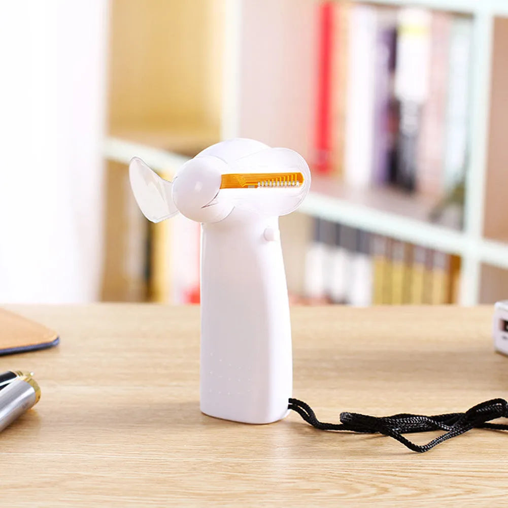 White handheld mini fan with LED flashing love pattern display