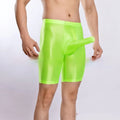 Plus size men's shiny silky sports shorts in multiple colours on a size chart background.