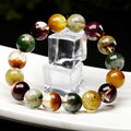 Ethnic style crystal bracelet with 10mm ball beads and colourful ghost cornucopia design.