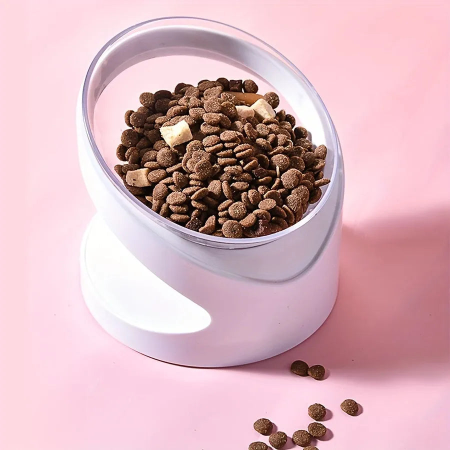 White elevated tilted plastic cat food bowl for ergonomic feeding.