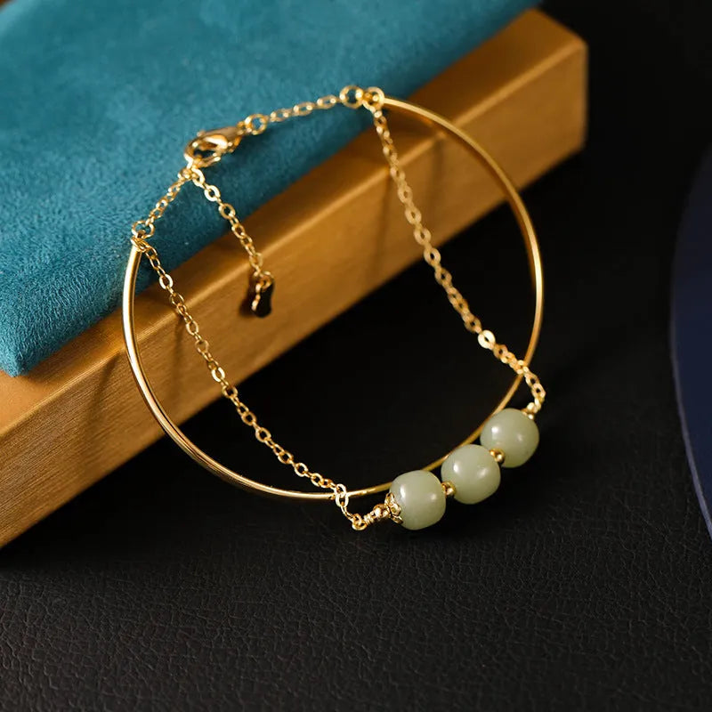 Hetian jade lucky beads bracelet with gold inlay detailing in women's single, double or three-bead versions