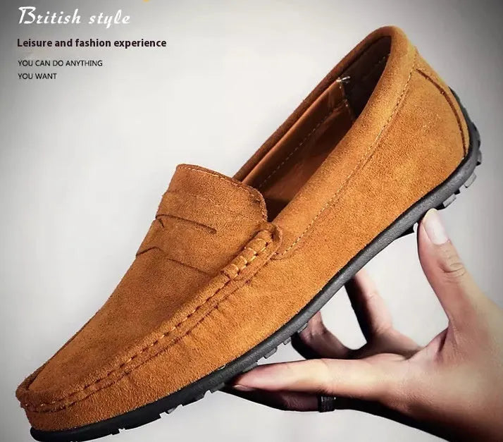 Men's suede leather casual loafers in brown colour with flat rubber sole and decorative stitching