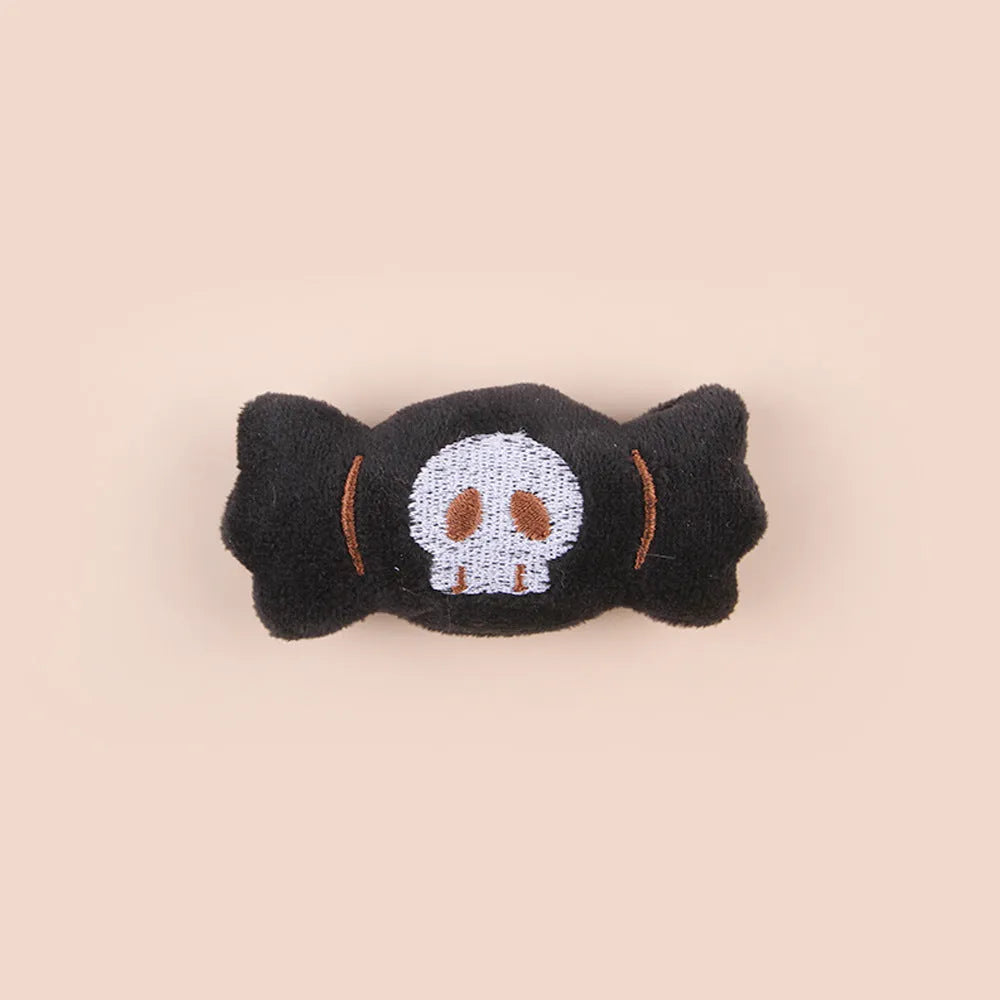 Small plush cat teaser wand with candy character design on flexible string