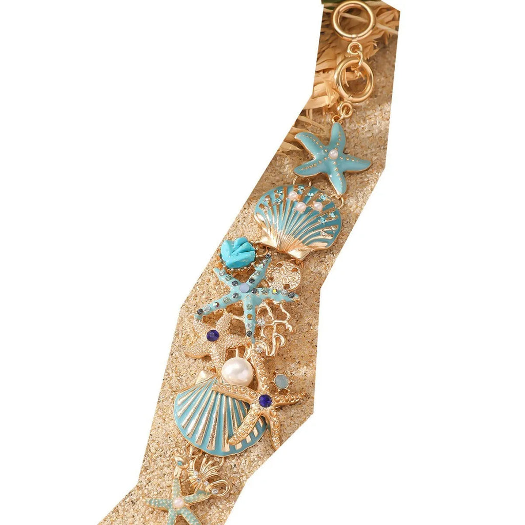 Women's alloy starfish bracelet in turquoise, coral red, or coral blue electroplated colour.
