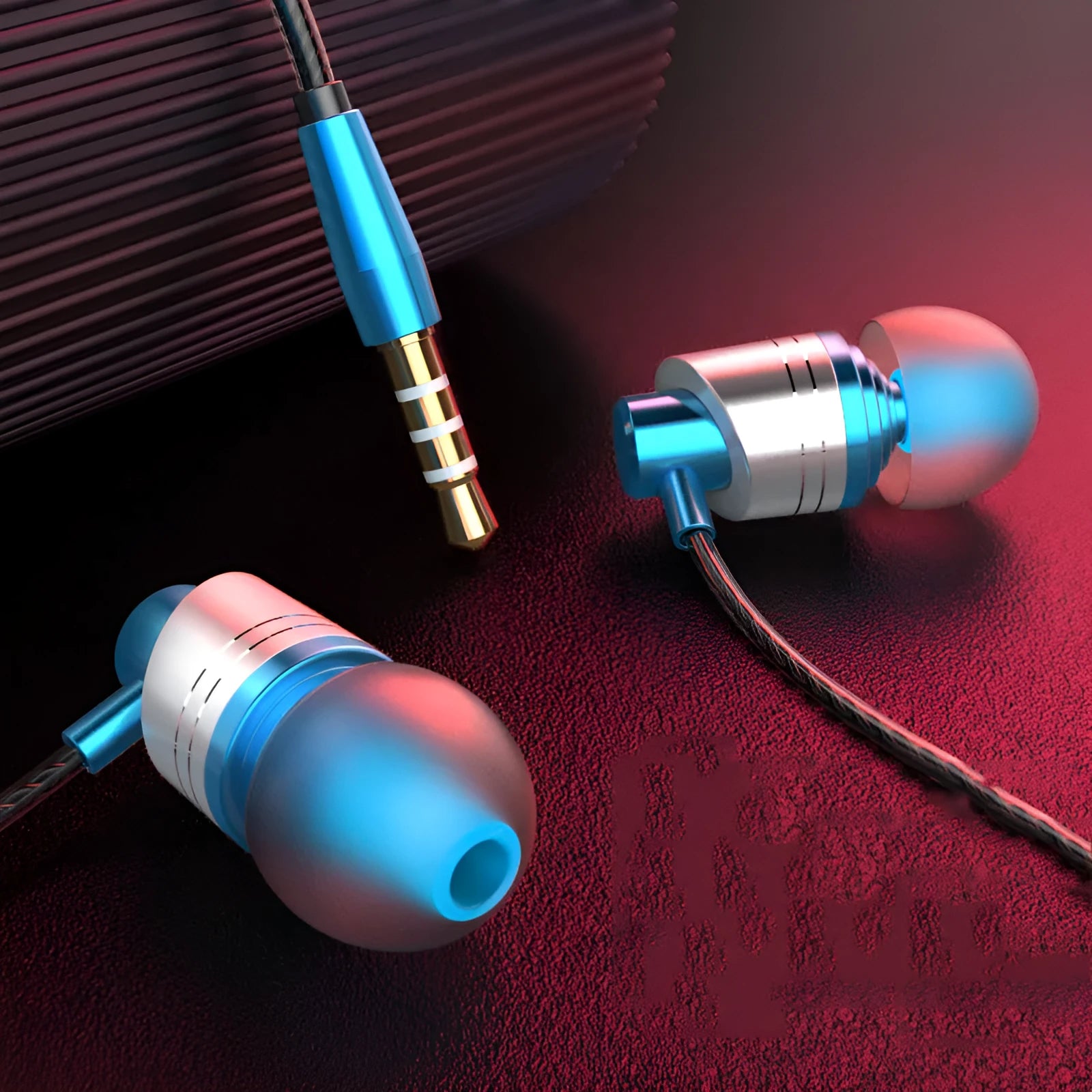 Black wired in-ear headset with 3.5mm plug, microphone on cable and silicone ear tips.